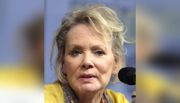 jean smart officiated her hacks co-star's wedding and pronounced them "husband and husband." i would like to be married by her immediately.